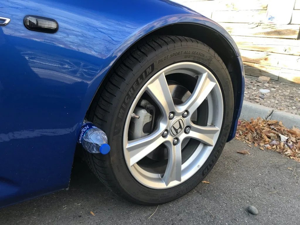 Why Put a Plastic Bottle on Your Car Tire When Parked