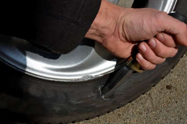 How to Puncture a Tire [Safely Deflate]